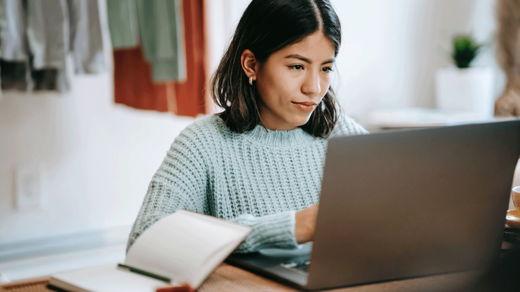 Photo of a woman researching an ecommerce platform for b2b