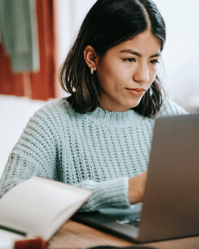 Photo of a woman researching an ecommerce platform for b2b